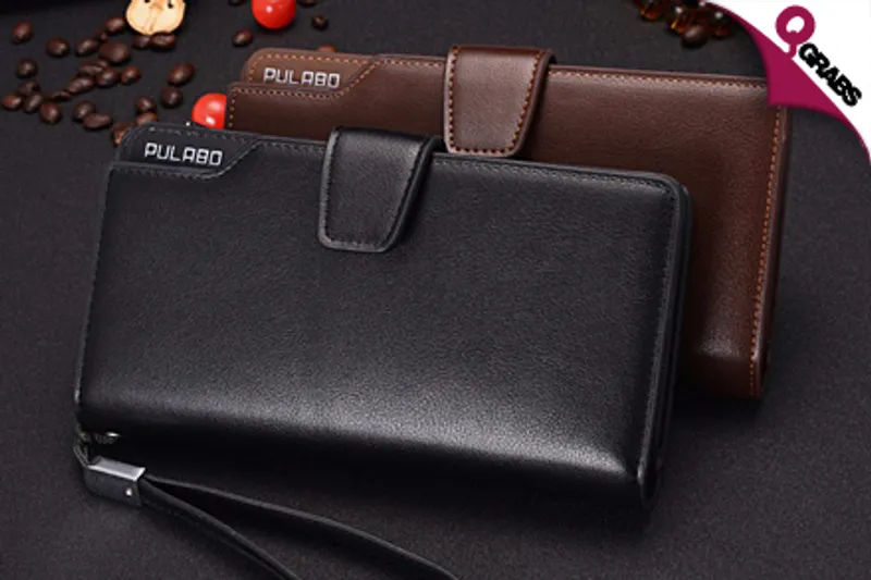From QR69, Grab a Long Wallet Organizer with Hand Strap for Men or Women - Choose from Black OR Brown! (Up to QR360 Value)